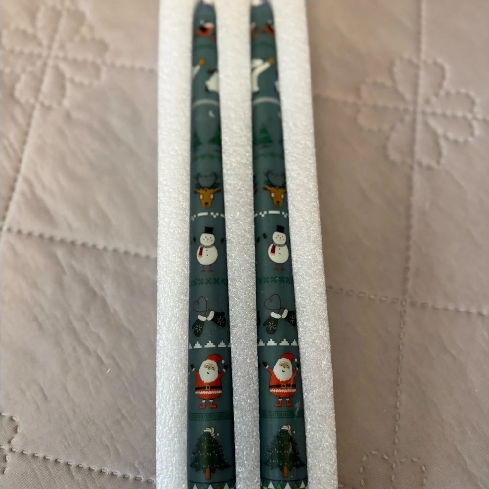 Christmas taper candles with a festive pattern, green 10”